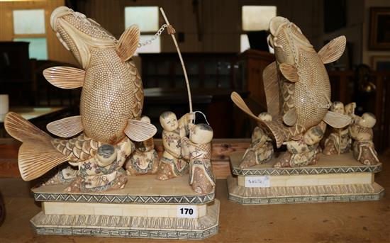 A pair of Chinese bone models of children fishing for carp